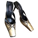 Golden with black leather pumps from Karl Lagerfeld