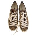 Signature print canvas and leather sneakers - Coach