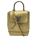 Louis Vuitton Lokme bag in golden leather