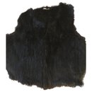 Black fur sleeveless vest - KOOKAÏ