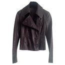 Prada jacket in nappa lambskin leather. Dark brown. lined-breasted with wide lapels.