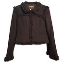 Chanel Little Black Wool Boucle Jacke mit Rüschen