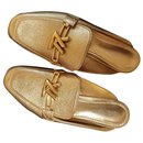 Louis Vuitton Pantoletten goldene Ledersandalen - Autre Marque