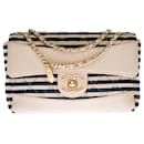 Superb & Rare Chanel New Mini Timeless single Flap bi-material shoulder bag in beige leather and navy blue quilted striped cotton with its wallet, garniture en métal doré