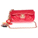 Splendid and highly sought after Chanel Valentine Mini Charms Flap bag in red quilted leather