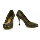 Dolce & Gabbana Zapatos de tacón de cuero marrón oscuro con punta redonda y tacón de madera sz 37,5 Zapatos