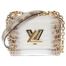 Exceptional and precious Louis Vuitton Twist Mini bag in white Niloticus crocodile leather!