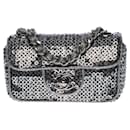 Extremely rare Chanel Mini Flap bag in silver embroidered micro sequins, Garniture en métal argenté