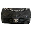 Chanel black single flap bag