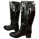 Prada black patent boots