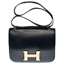 Splendid Hermès Constance bag 23 in navy blue box leather, plated metal trim