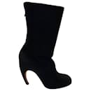 Givenchy Round Toe Curved Calf Length Boots in Black Suede