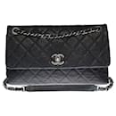 Very chic and Rare classic Chanel shoulder bag "31 rue Cambon "single flap in black quilted leather, antique silver metal trim