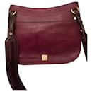 Crossbody bag in burgundy with ponyhair trim - Brian Atwood