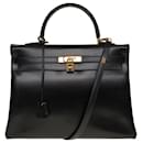 Exceptionnel Sac Hermès Kelly 35 retourné bandoulière en cuir box noir, garniture en métal plaqué or