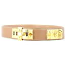 Vintage Hermes Medor belt in gold leather and golden hardware. - Hermès
