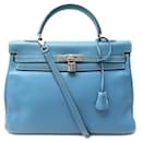 Hermès Kelly handbag 35 RETURNS IN BLUE TOGO LEATHER JEANS BANDOULIERE HAND BAG