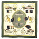 Hermès carré Les Voitures a Transformation scarf in khaki, yellow & navy silk  