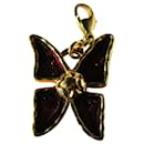 Butterfly charms. - Yves Saint Laurent