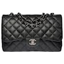 Le Majestueux Chanel Timeless Jumbo Flap bag shoulder bag in black quilted perforated leather, Garniture en métal argenté