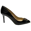 Jimmy Choo Double Buckle Toe Pumps in Black Patent Leather