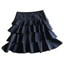 Black ruffled skirt Adolfo Dominguez polyester and cotton T. 36