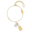 Bracelet LV avec étiquettes - Louis Vuitton