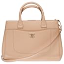 Superb Chanel Cabas Neo Executive bag in powder pink grained leather, champagne metal trim