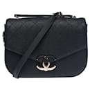 Splendid and Rare Chanel Coco Cuba Top Handle Medium Flap Bag in black caviar leather, champagne metal trim