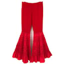 Pantalon Valentino en crêpe de soie rouge à volant évasé