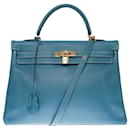 Stunning Hermes Kelly handbag 35 flipped Swift leather shoulder strap in Blue Jeans with white stitching , gold plated metal trim - Hermès
