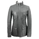 Céline jacket in grey leather with zip pockets and hidden hood
