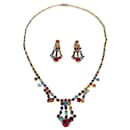 Art déco jewelry set - necklace and clip-on earrings. Multicolour rhinestones are set in golden tone frame. - Vintage