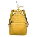 Fendi bag mini backpack charms in grained yellow leather