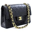 Chanel 2.55 Bolso de hombro pequeño con cadena y solapa forrada Piel de cordero negra