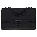Beautiful Chanel Timeless/Classique Travel Line Flap bag medium handbag in black woven nylon, black metal trim