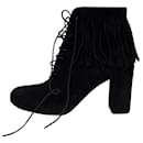 Saint Laurent lace up fringed ankle boots