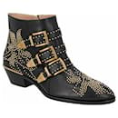 Chloé women susanna short boots in black leather with gold studs