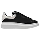 Oversized Sneakers in Black Leather and white Heel - Alexander Mcqueen