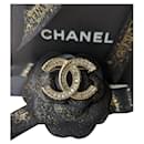 CC B14P Crystal Enamel Ruffled Logo GHW Brooch - Chanel