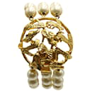 Bracelet Salvatore Ferragamo en fausses perles avec fermoir circulaire en métal doré