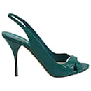 Zapatos de tacón destalonados con punta abierta de Miu Miu en charol verde