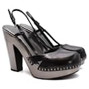 Black & Gunmetal leather heeled clogs - Prada