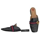 Gucci Peyton mules in black leather with Gs