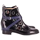 Christian Louboutin + Jonathan Saunders Scubabootie 25 Ankle Boots in Black Leather