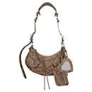 Balenciaga Women Le Cagole XS in Brown with Monogram printed leather