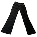 Un pantalon, leggings - Louis Vuitton