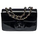 Lovely and Rare Chanel Timeless Camélia Mini flap bag handbag in black patent leather, garniture en métal doré