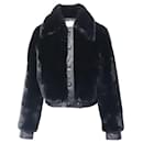 Sandro Paris Fauny Leather Trimmed Jacket in Black Faux Fur