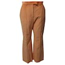 Pantalones de pana naranja con dobladillo acampanado de Acne Studios